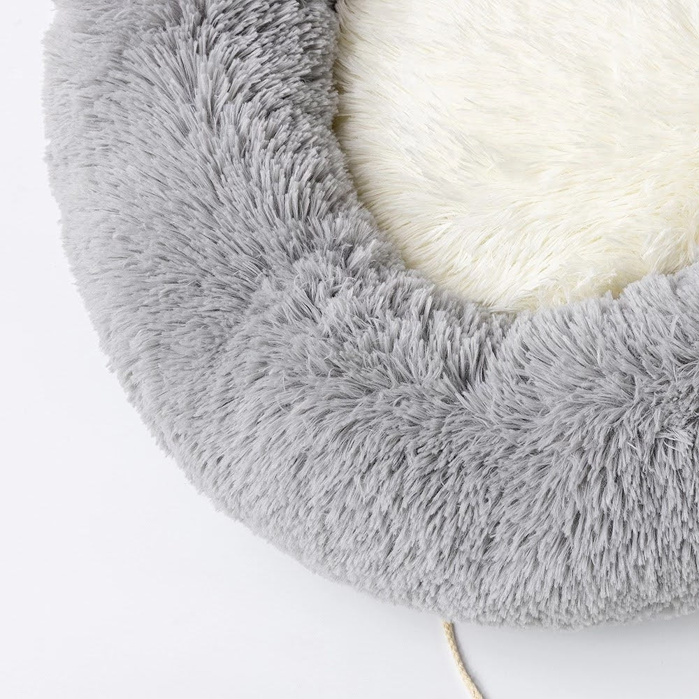 Close-up of plush texture and pompom tail on pet bed – Blessed Paws